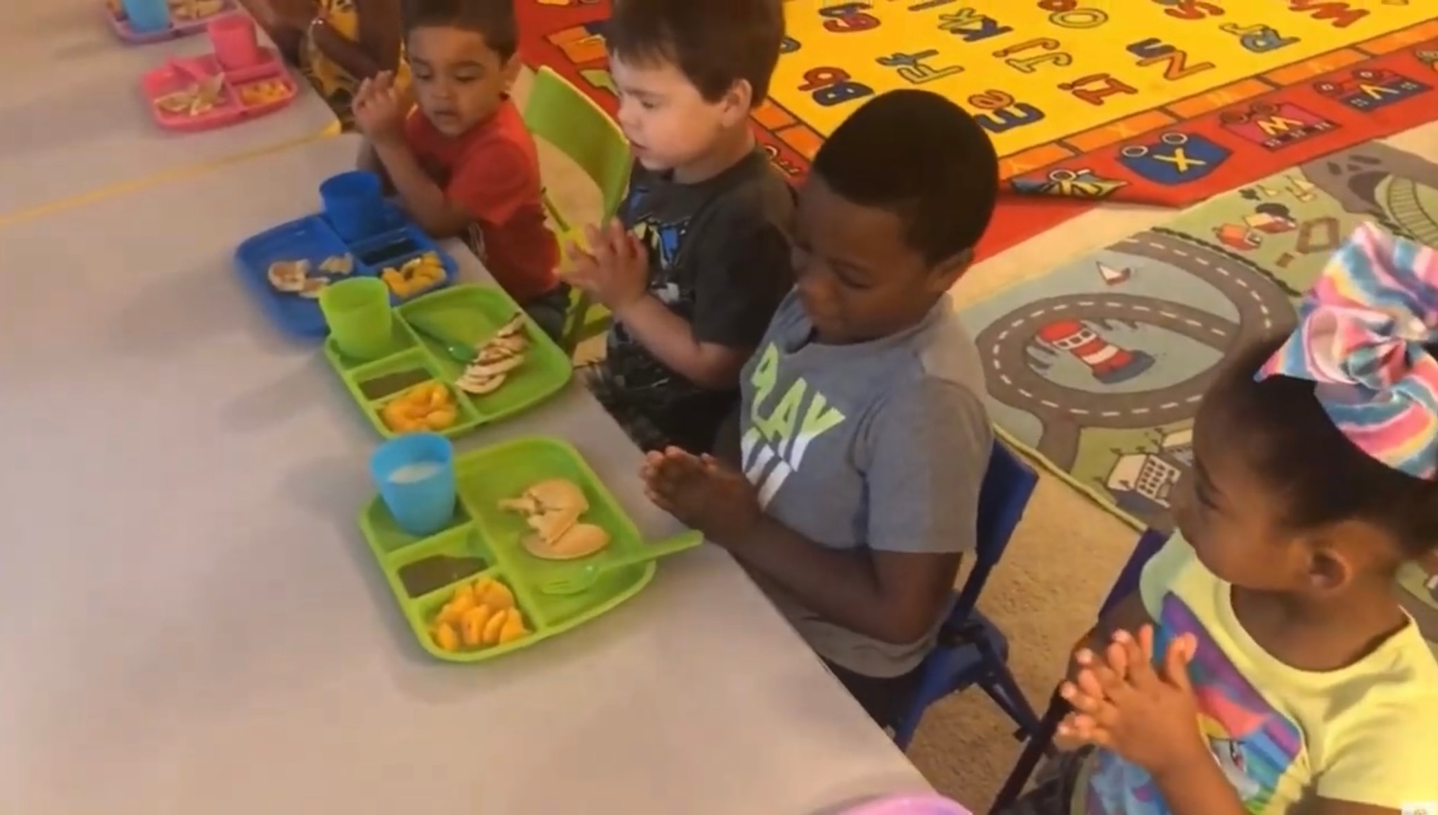 Children enjoying snack time together